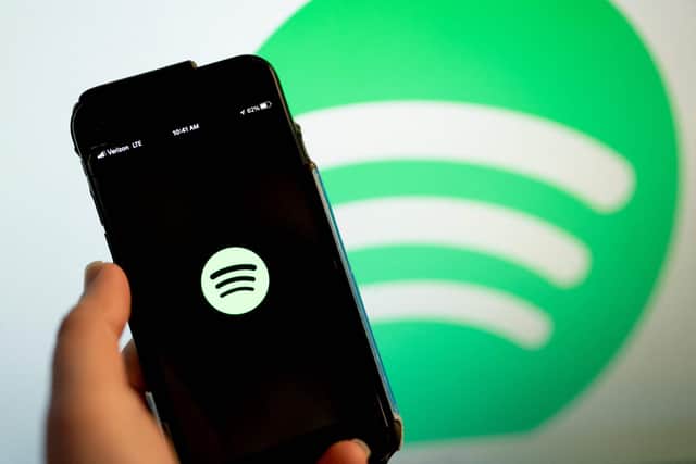 Shares in Spotify tumbled as the streaming firm tried to counter criticism of its misinformation policies. Picture: Stefani Reynolds/AFP/Getty