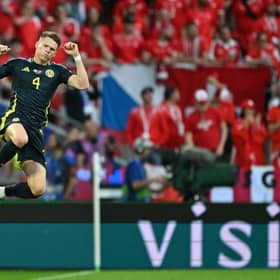Scotland's Scott McTominay celebrates his opening goal against Switzerland in the 1-1 draw at Euro 2024. (Photo by OZAN KOSE/AFP via Getty Images)
