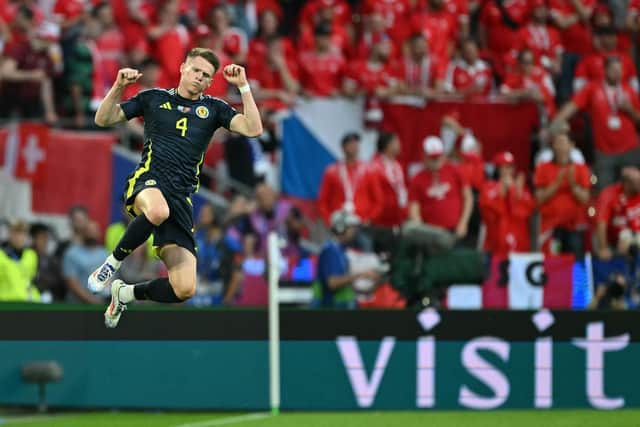 Scotland's Scott McTominay celebrates his opening goal against Switzerland in the 1-1 draw at Euro 2024. (Photo by OZAN KOSE/AFP via Getty Images)