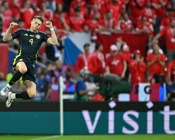 Scotland's Scott McTominay celebrates his opening goal against Switzerland in the 1-1 draw at Euro 2024. (Photo by OZAN KOSE/AFP via Getty Images)