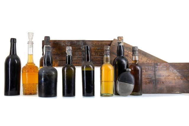 A decanter of whisky rescued by divers from a 130-year-old shipwreck in the Firth of Clyde will be the top lot at an auction in Glasgow next month.