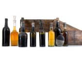 A decanter of whisky rescued by divers from a 130-year-old shipwreck in the Firth of Clyde will be the top lot at an auction in Glasgow next month.