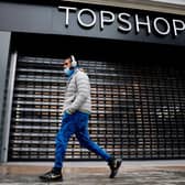 Asos has now bought over the Topshop brand,  but this has not saved high street stores from closing down   (Picture: AFP/Getty Images)
