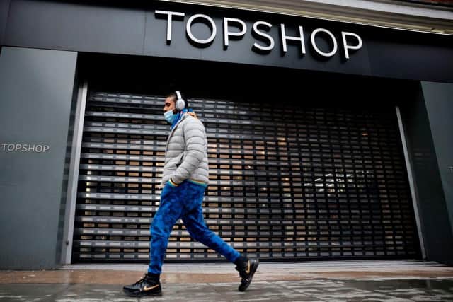 Asos has now bought over the Topshop brand,  but this has not saved high street stores from closing down   (Picture: AFP/Getty Images)