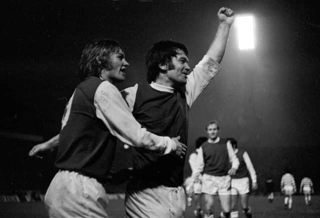 Jimmy O'Rouke (right) celebrates his match winning goal for Hibs in the 2-1 victory over Celtic in the 1972 League Cup final at Hampden
