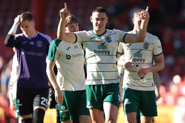 Hibs' Lewis Miller leads the celebrations after the 2-0 win at Aberdeen.