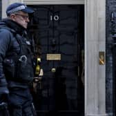 A police officer walks past 10 Downing Street. Picture: Rob Pinney/Getty Images