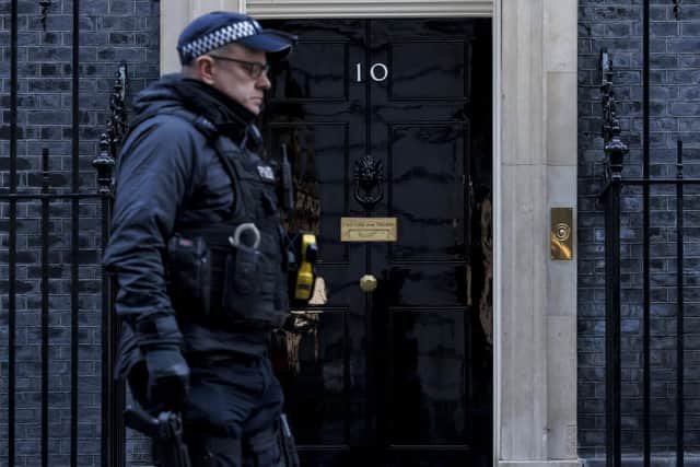 A police officer walks past 10 Downing Street. Picture: Rob Pinney/Getty Images