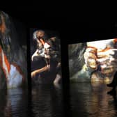 Images of paintings by Spanish painter Francisco de Goya displayed on video screens at the Fernan Gomez Centro Cultural de la Villa in Madrid (Picture: Gabriel Bouys/AFP via Getty Images)