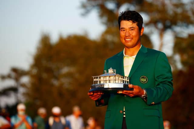 Hideki Matsuyama with the Masters Trophy during the Green Jacket Ceremony after winning the Masters at Augusta National Golf Club. Picture: Jared C. Tilton/Getty Images.