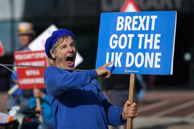 A protester at the Conservative Party Conference in Birmingham last October (Picture: Ian Forsyth/Getty Images)