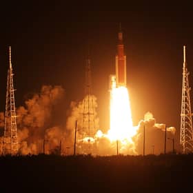 CAPE CANAVERAL, FLORIDA - NOVEMBER 16: NASA’s Artemis I Space Launch System (SLS) rocket, with the Orion capsule attached, launches at NASA's Kennedy Space Center on November 16, 2022 in Cape Canaveral, Florida. The Artemis I mission will send the uncrewed spacecraft around the moon to test the vehicle's propulsion, navigation and power systems as a precursor to later crewed mission to the lunar surface. (Photo by Red Huber/Getty Images)