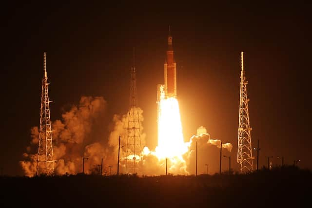 CAPE CANAVERAL, FLORIDA - NOVEMBER 16: NASA’s Artemis I Space Launch System (SLS) rocket, with the Orion capsule attached, launches at NASA's Kennedy Space Center on November 16, 2022 in Cape Canaveral, Florida. The Artemis I mission will send the uncrewed spacecraft around the moon to test the vehicle's propulsion, navigation and power systems as a precursor to later crewed mission to the lunar surface. (Photo by Red Huber/Getty Images)