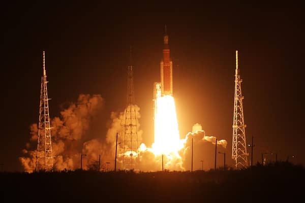 CAPE CANAVERAL, FLORIDA - NOVEMBER 16: NASA’s Artemis I Space Launch System (SLS) rocket, with the Orion capsule attached, launches at NASA's Kennedy Space Center on November 16, 2022 in Cape Canaveral, Florida. The Artemis I mission will send the uncrewed spacecraft around the moon to test the vehicle's propulsion, navigation and power systems as a precursor to later crewed mission to the lunar surface. (Photo by Red Huber/Getty Images)