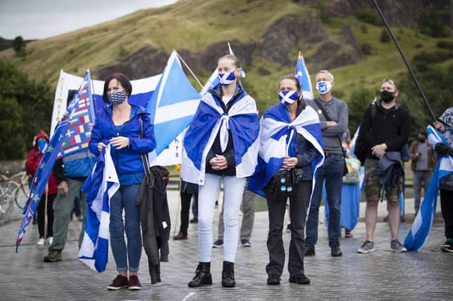 Members from All Under One Banner take part in a static demonstration for Scottish independence outside the Scottish Parliament in Edinburgh. Picture: Jane Barlow/PA Wire