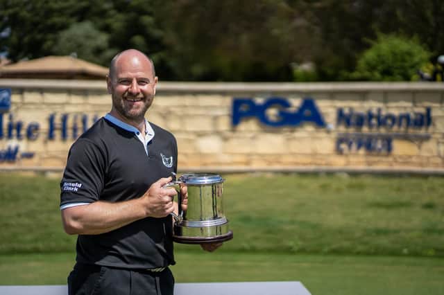 The smile on his face says it all as Craig Lee shows off the trophy after winning the PGA Play-Offs at Aphrodite Hills in Cyprus. Picture: The PGA