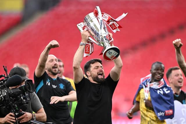 Russell Martin celebrates winning promotion to the Premier League with Southampton through the play-offs. (Image: Mike Hewitt/Getty Images)