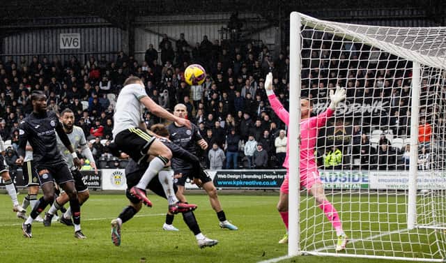Celtic's Alistair Johnston first goal for the club should not have stood with the ball inadvertently striking the Canadian's arm on its way into the net. (Photo by Craig Williamson / SNS Group)