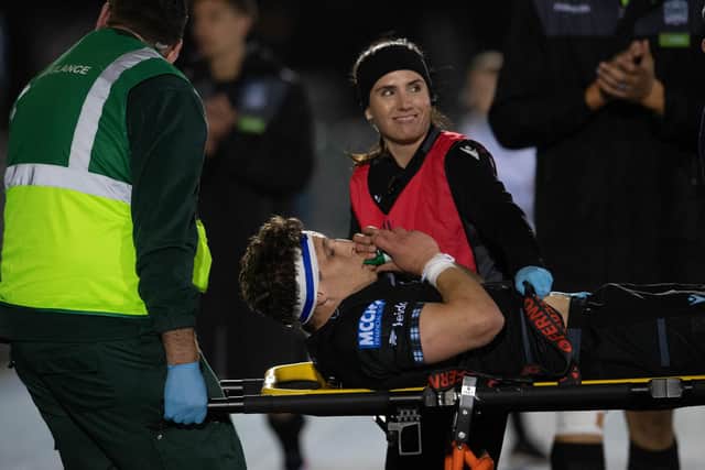 Glasgow Warriors' Rory Darge is carried off after injuring his ankle against Cardiff at Scotstoun. (Photo by Ross Parker / SNS Group)