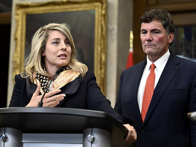 Minister of Foreign Affairs Melanie Joly, left, and Minister of Public Safety, Democratic Institutions and Intergovernmental Affairs Dominic LeBlanc, right, speak to reporters in the Foyer of the House of Commons on Parliament Hill after Prime Minister Justin Trudeau announced that Canadian authorities had intelligence that India’s government may have had links to the June assassination of a Sikh activist in Canada.