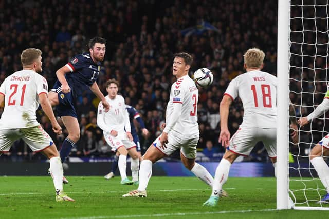 Scotland’s John Souttar heads home the opener in the 2-0 win over Denmark at Hampden. (Photo by Craig Foy / SNS Group)