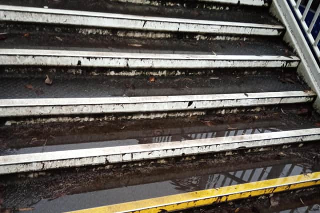 Waterlogged, dirty steps on a station footbridge in Glasgow only a decade old. Picture: The Scotsman