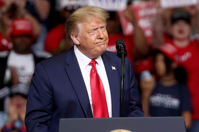 Donald Trump's rhetoric about the election is inflaming 'dangerous passions' among his supporters, according to fellow Republican Mitt Romney (Picture: Win McNamee/Getty Images)