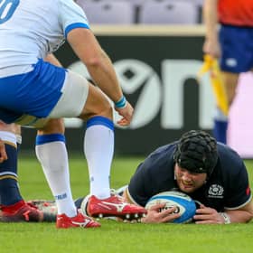 Zander Fagerson flops over for a Scotland try after Italy seemed to freeze.