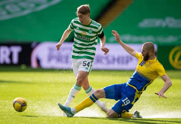 Adam Montgomery (left) evades St Johnstone's Shaun Rooney during the Celtic youngster's first-team debut on Wednesday.| (Photo by Paul Devlin / SNS Group)