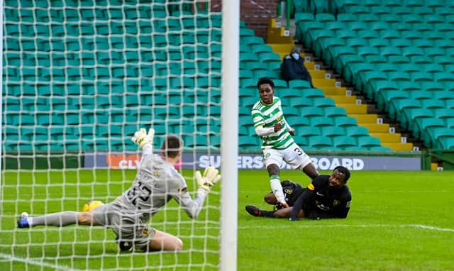 Celtic's Jeremie Frimpong has a first half strike saved by Livingston goalkeeper Max Stryjek. It proved one of the few chances the home side created in a soulless draw. (Photo by Rob Casey / SNS Group)