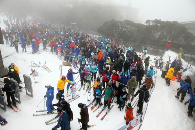 Skiers and snowboarders line up for the Blue Bullett ski lift at Mount Buller, Australia. Could AI help reduce lift lines in future? PIC: Robert Cianflone/Getty Images