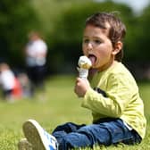 Aahid Faraz, 2, cools down with an ice-cream in Glasgow today. Pic: John Devlin