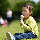 Aahid Faraz, 2, cools down with an ice-cream in Glasgow today. Pic: John Devlin