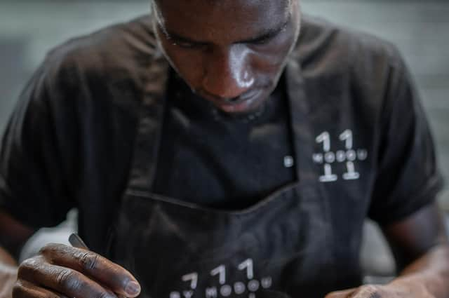 Modou preparing dish