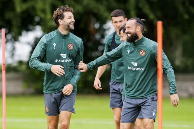 Charlie Mulgrew and Steven Fletcher share a laugh during Wednesday's Dundee United training session. (Photo by Mark Scates / SNS Group)