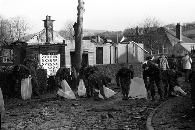 Some of the Gordon Highlanders brought in to help search for more of the wrecked Pan Am jumbo jet, scouring Sherwood Crescent, the road most devastated by the Boeing 747 which crashed on Lockerbie. Eleven local people are believed to have died in their homes.