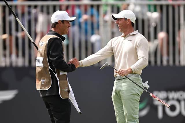 Rory McIlroy, pictured celebrating with caddie Harry Diamond after his birdie-birdie finish to win in 2023, will be back to defend the Genesis Scottish Open title at The Renaissance Club in July. Picture: Jared C. Tilton/Getty Images.