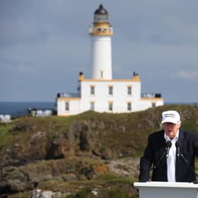 Donald Trump, pictured here at Turnberry, owns 17 golf courses across the world. (Pic: PA)