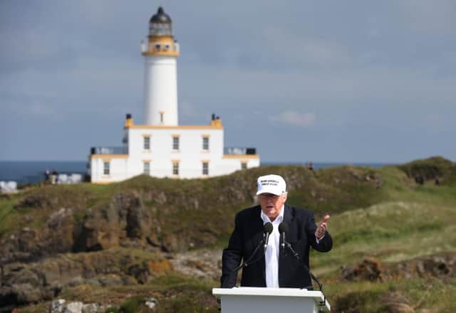 Donald Trump, pictured here at Turnberry, owns 17 golf courses across the world. (Pic: PA)