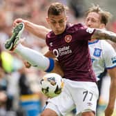 Hearts' Kenneth Vargas holds off Rangers' Ben Davies during the William Hill Premiership opener at Tynecastle. (Photo by Alan Harvey / SNS Group)