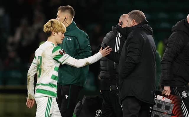 Celtic manager Ange Postecoglou commiserates with Kyogo Furuhashi after he is forced off with injury during the 3-2 win over Real Betis. (Photo by Craig Williamson / SNS Group)