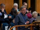 The Rev Mike Goss speaks at the Assembly on fuel poverty and excess profits.