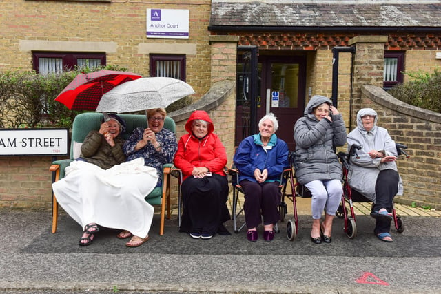 Even the rain was not enough to dampen the spirits as people waited for the fancy dress parade.