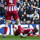 Rangers midfielder Ryan Jack brings down St Johnstone's Adam Montgomery in a challenge that prompted a VAR check - but Willie Collum stuck with his original yellow card decision. (Photo by Rob Casey / SNS Group)