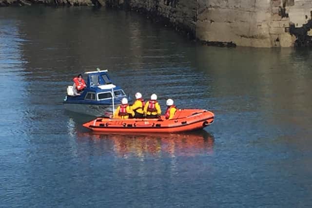 The stricken boat being towed into Dunbar harbour. Picture: Ian Wilson/Dunbar RNLI