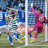 Daizen Maeda heads home Celtic's 100th league goal of the season during the 4-1 win over Kilmarnock.