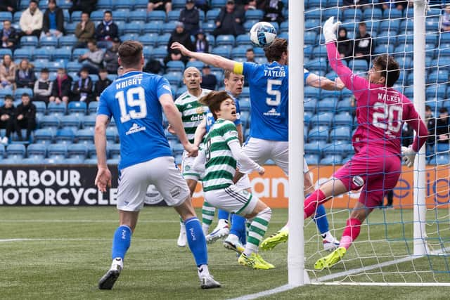 Daizen Maeda heads home Celtic's 100th league goal of the season during the 4-1 win over Kilmarnock.