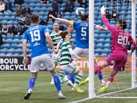 Daizen Maeda heads home Celtic's 100th league goal of the season during the 4-1 win over Kilmarnock.