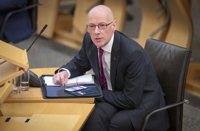 Deputy First Minister John Swinney said that ipads are the "jotters of the 21st century".