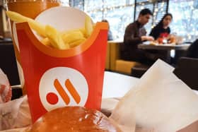 People have a lunch in a "Vkusno i tochka" (tasty and that's it!) restaurant, former McDonald's Russia chain, in Moscow. Vkusno i tochka, owned by Russian businessman Alexander Govor, bought and re-branded  850 restaurants of former McDonald's Russia chain, as McDonald's left Russia.